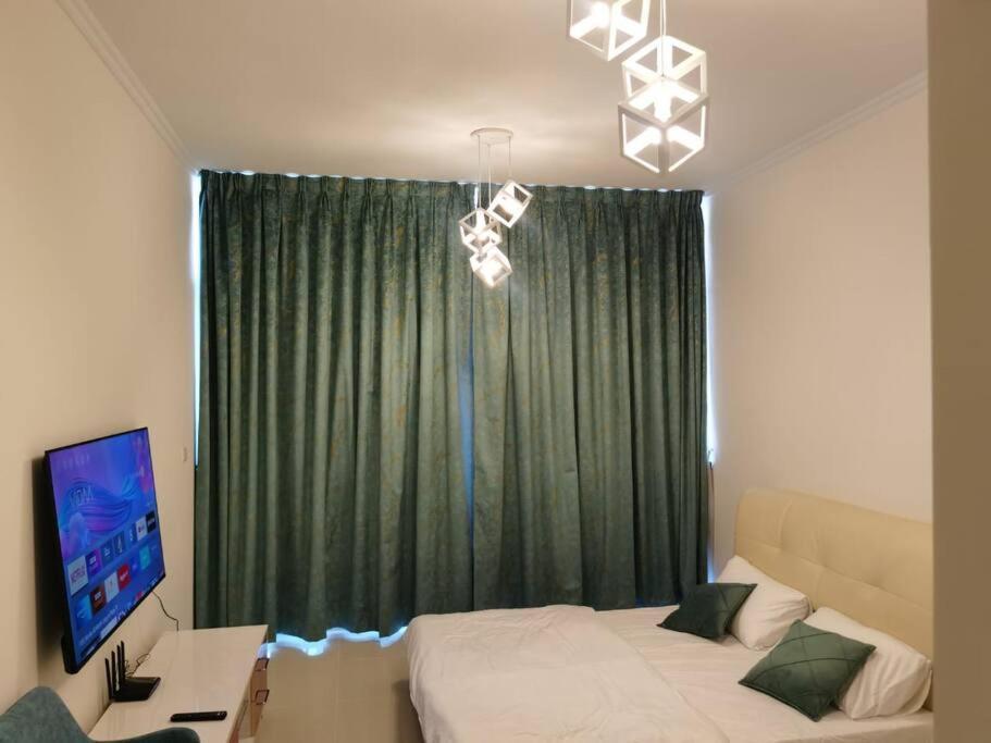 Gharfar 31715 Serene Teal Theme-high Floor-pool Apartment Dubai